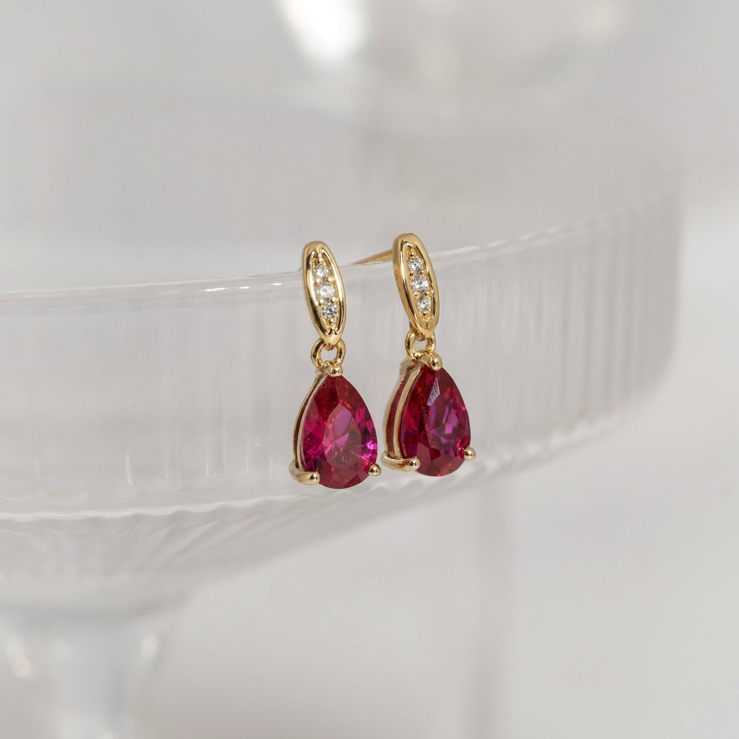 Pear Cut Created Ruby With Lab Grown Diamond Accent Drop Earrings