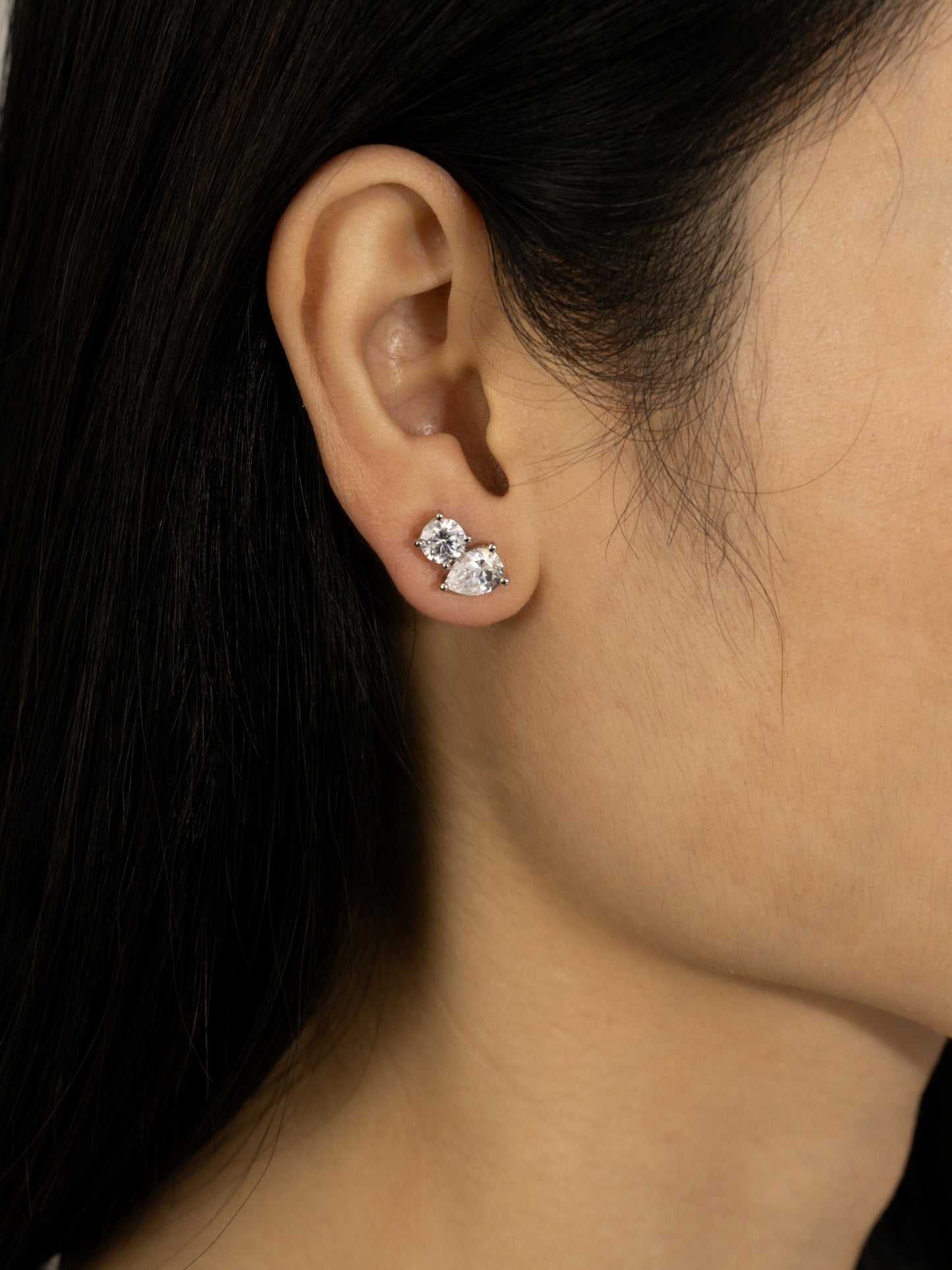 DIAMONBLISS Silver-tone Brass Pear and Round Toi et moi Stud Earrings| Embellished with Swarovski® Zirconia| 4 cttws