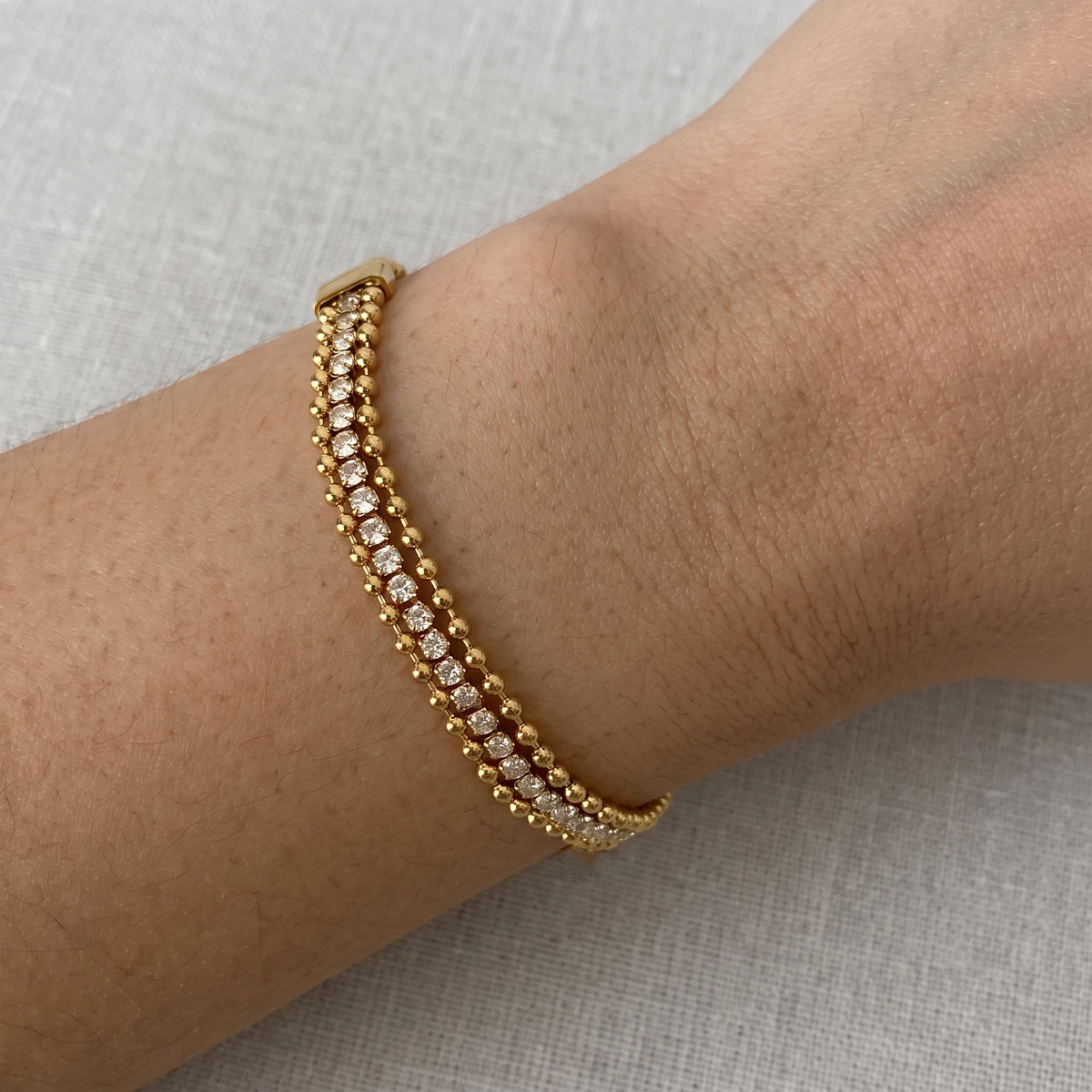 Aquabliss Gold-Tone Stainless Steel 3-Row Bead and Cubic Zirconia Tennis Bracelet