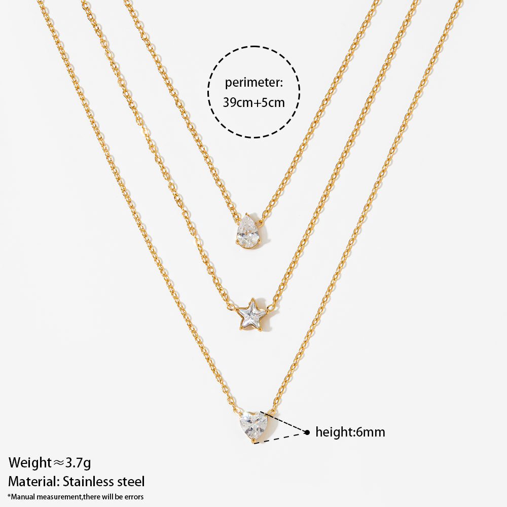 Aquabliss Triple Layer Gold-Tone Stainless Steel Necklace with Teardrop, Star, and Heart Pendants