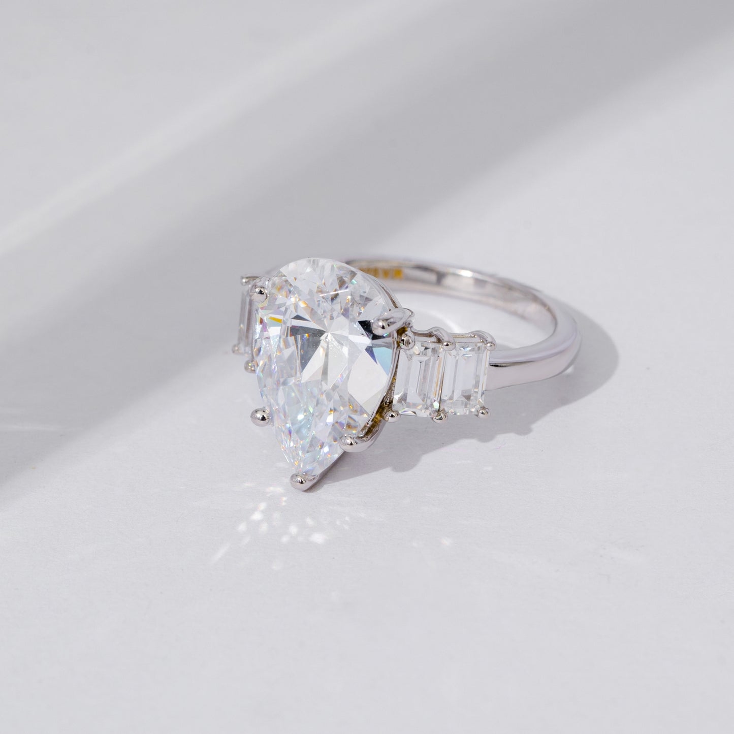 Vertical Baguette Accented Solitaire Ring