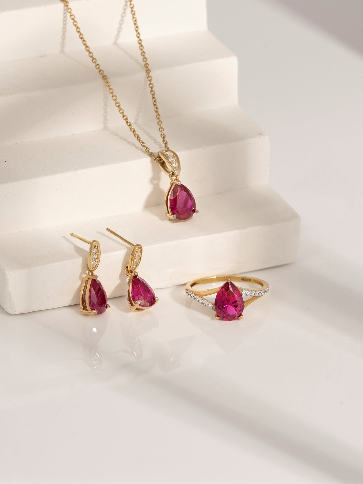 Pear Cut Created Ruby With Lab Grown Diamond Accent Ring