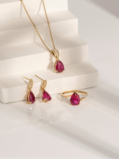 Pear Cut Created Ruby With Lab Grown Diamond Accent Ring
