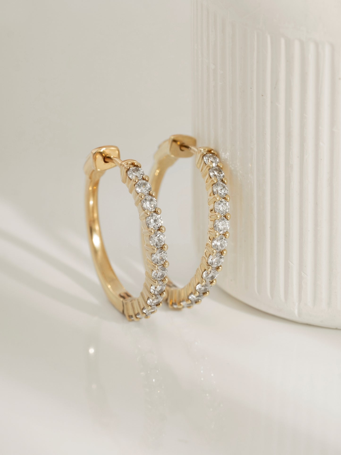 DIAMONBLISS Yellow-tone Brass Hoop Earrings| Embellished with Swarovski® Zirconia|  1.5'' outer diameter| 2 cttws