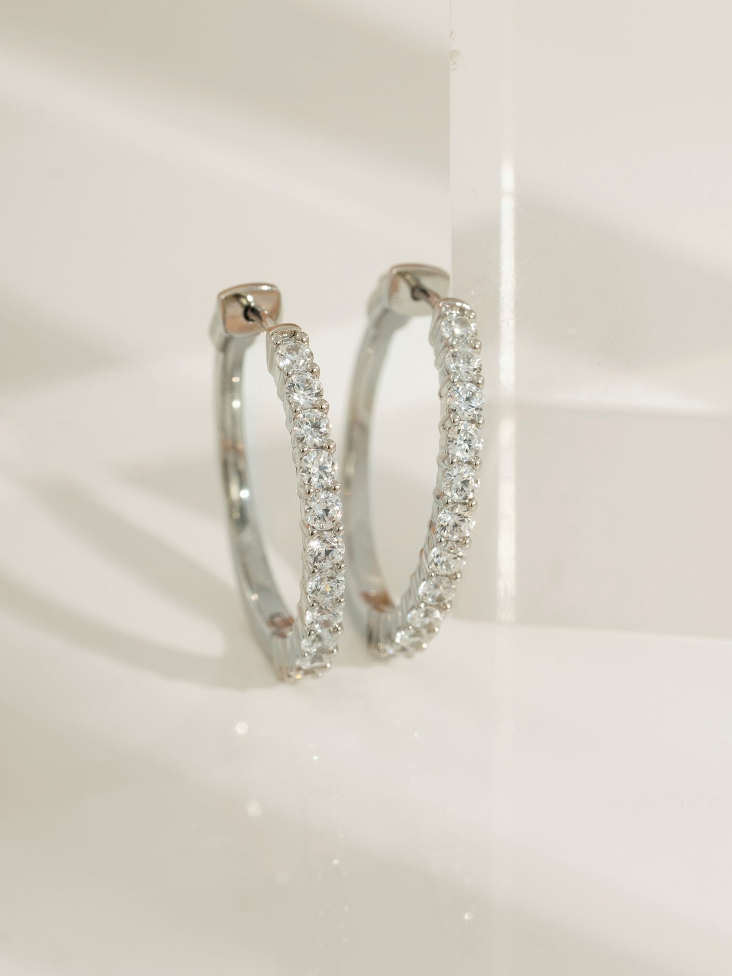 DIAMONBLISS Silver-tone Brass Hoop Earrings| Embellished with Swarovski® Zirconia|  1.5'' outer diameter| 2 cttws