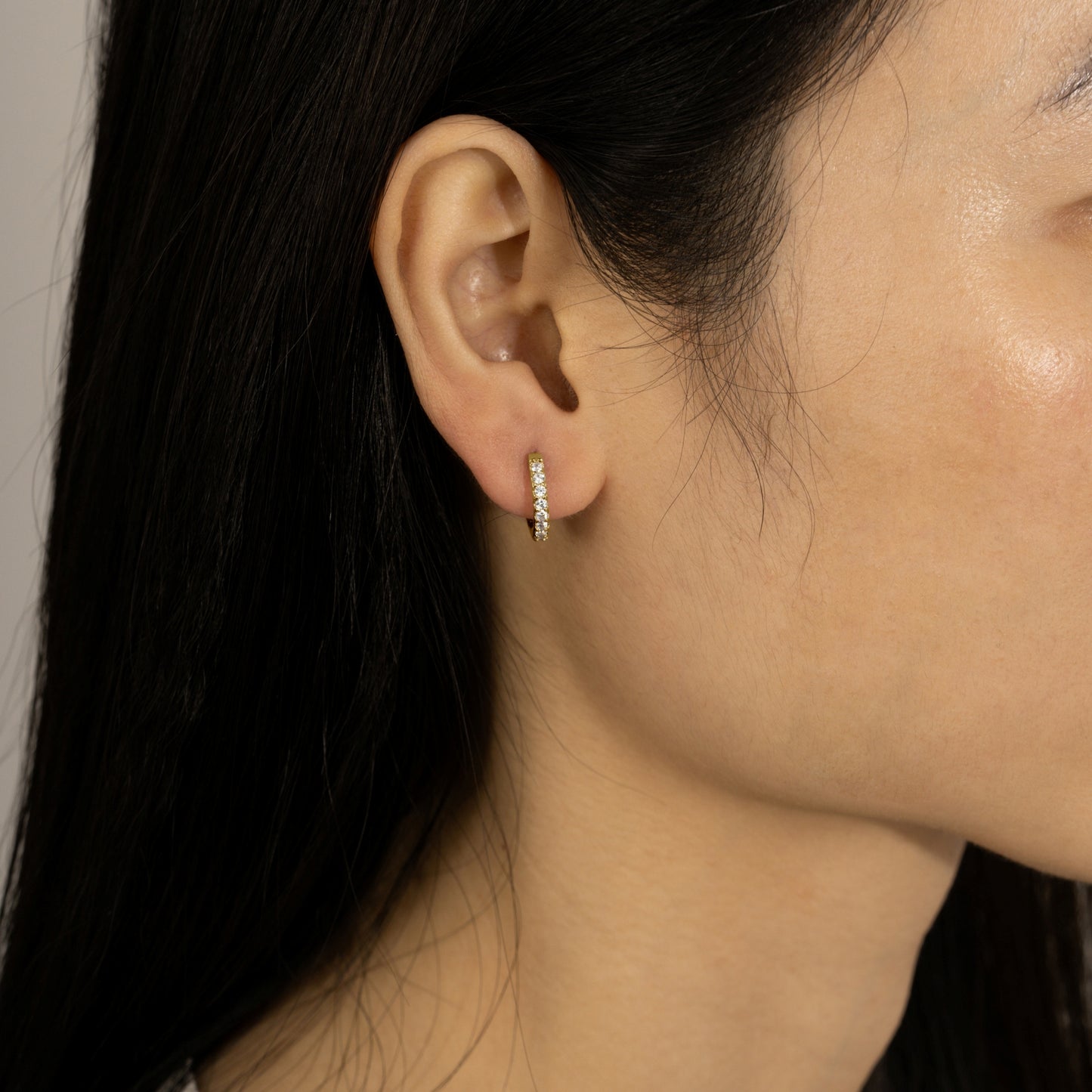 DIAMONBLISS Yellow-tone Brass Huggies Earrings| Embellished with Swarovski® Zirconia|  0.5 cttws