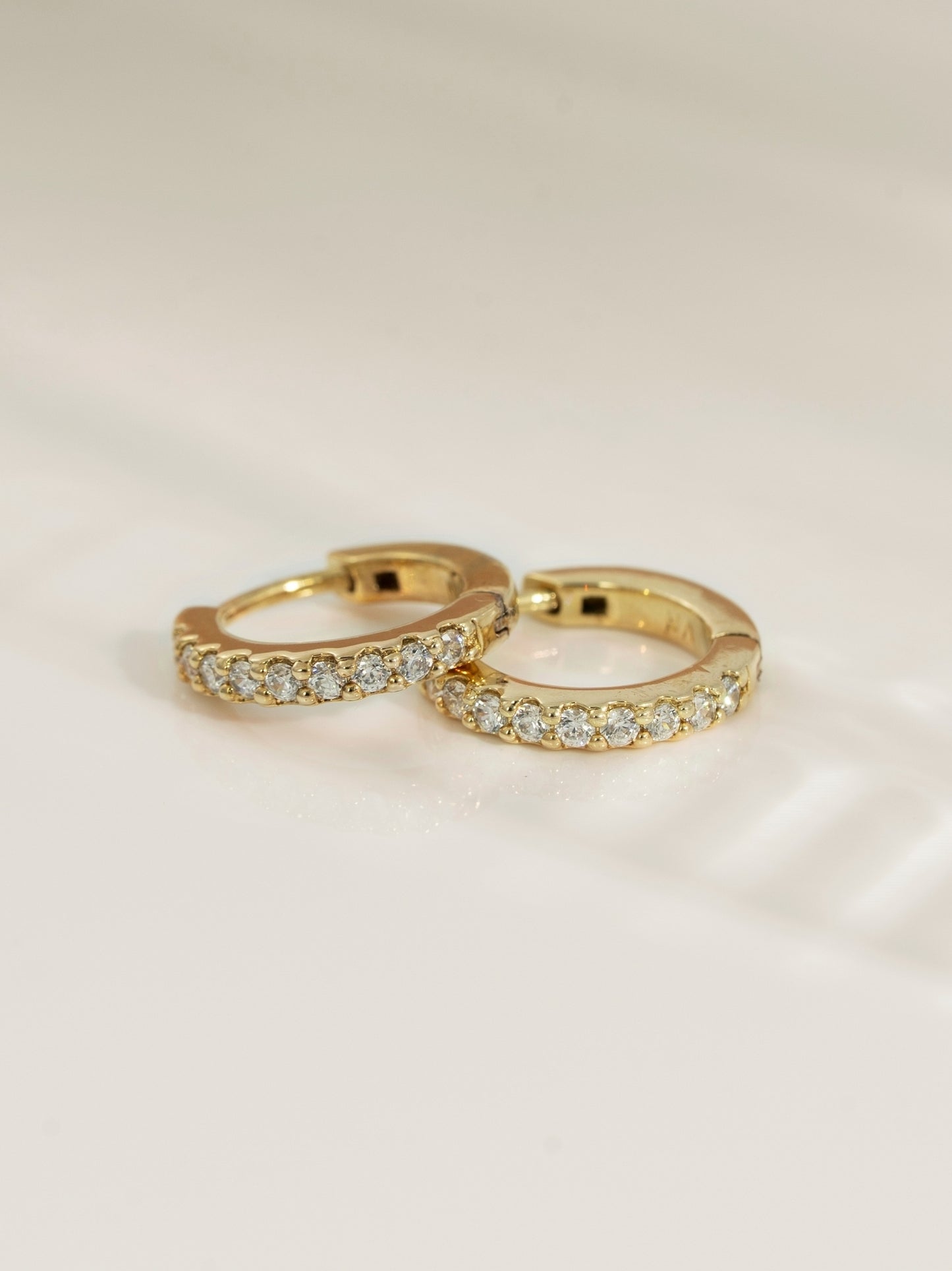 DIAMONBLISS Yellow-tone Brass Huggies Earrings| Embellished with Swarovski® Zirconia|  0.5 cttws