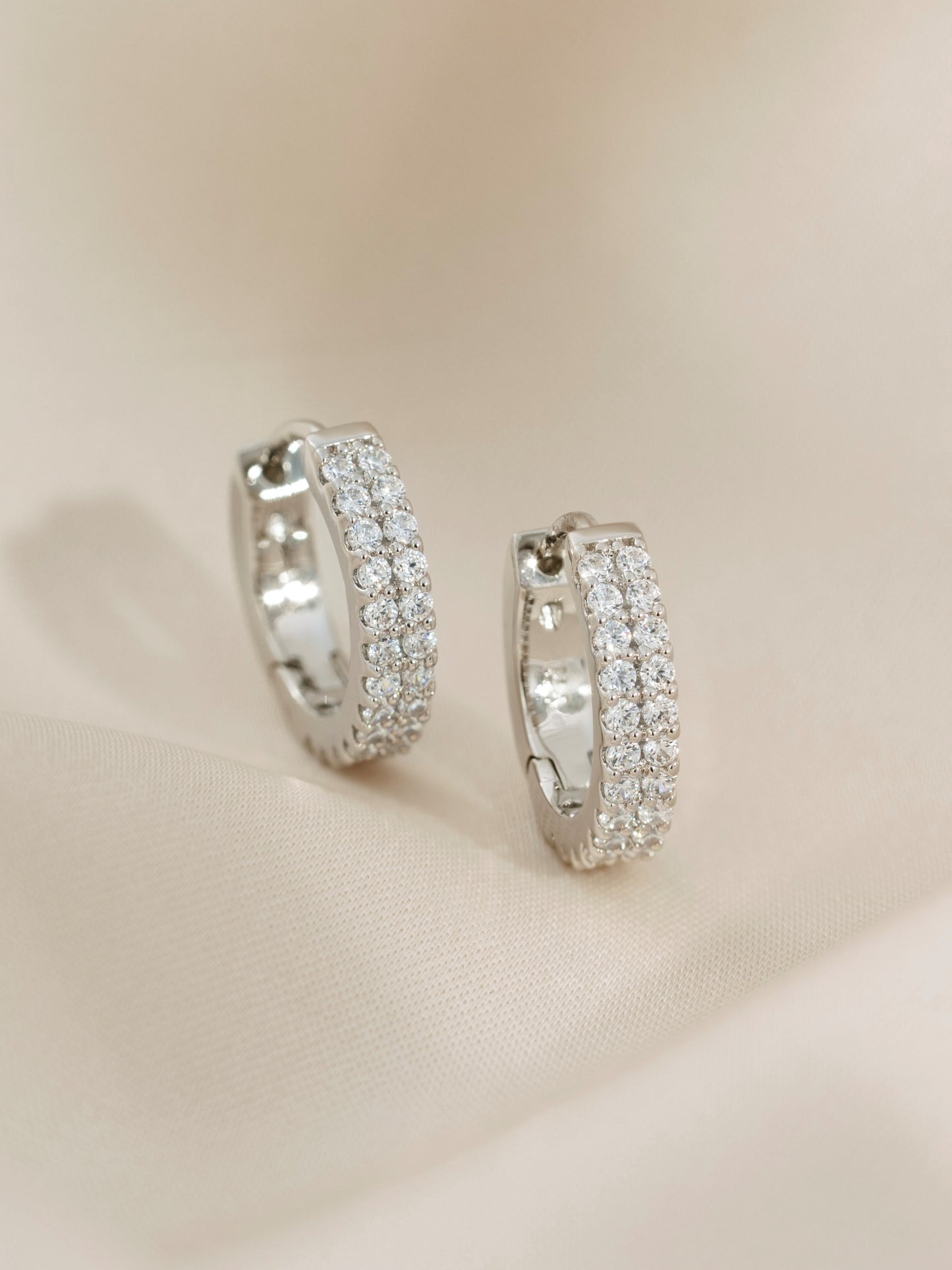 DIAMONBLISS Silver-tone Brass Huggies Earrings| Embellished with Swarovski® Zirconia|  0.5 cttws