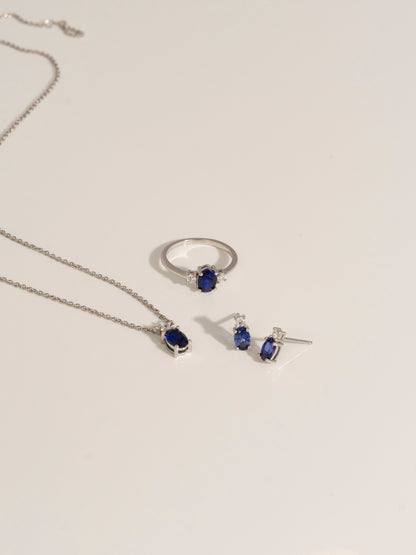 Oval Cut Created Sapphire And Lab Grown Diamond Three Stones Ring