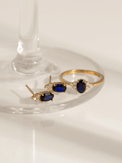 Oval Cut Created Sapphire With Trio Lab Grown Diamond On Shank Engagement Ring