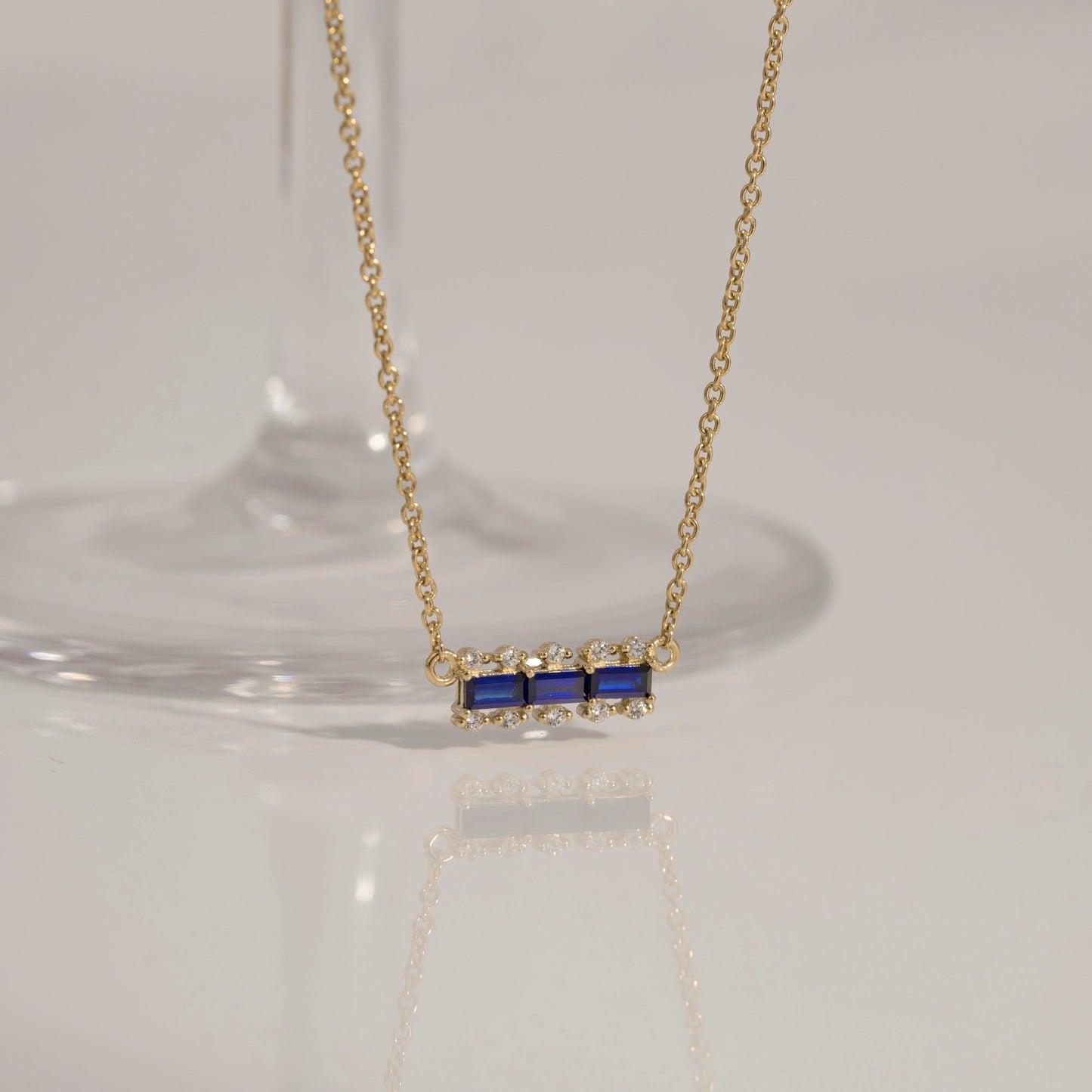Baguette Cut Created Sapphire With Lab Grown Diamond Accent Bar Pendant Necklace