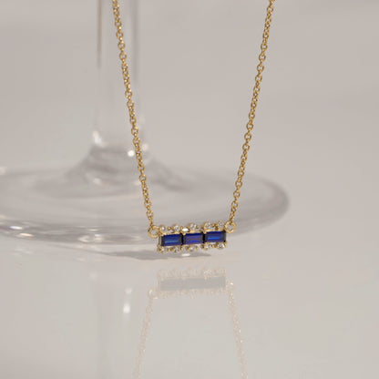 Baguette Cut Created Sapphire With Lab Grown Diamond Accent Bar Pendant Necklace