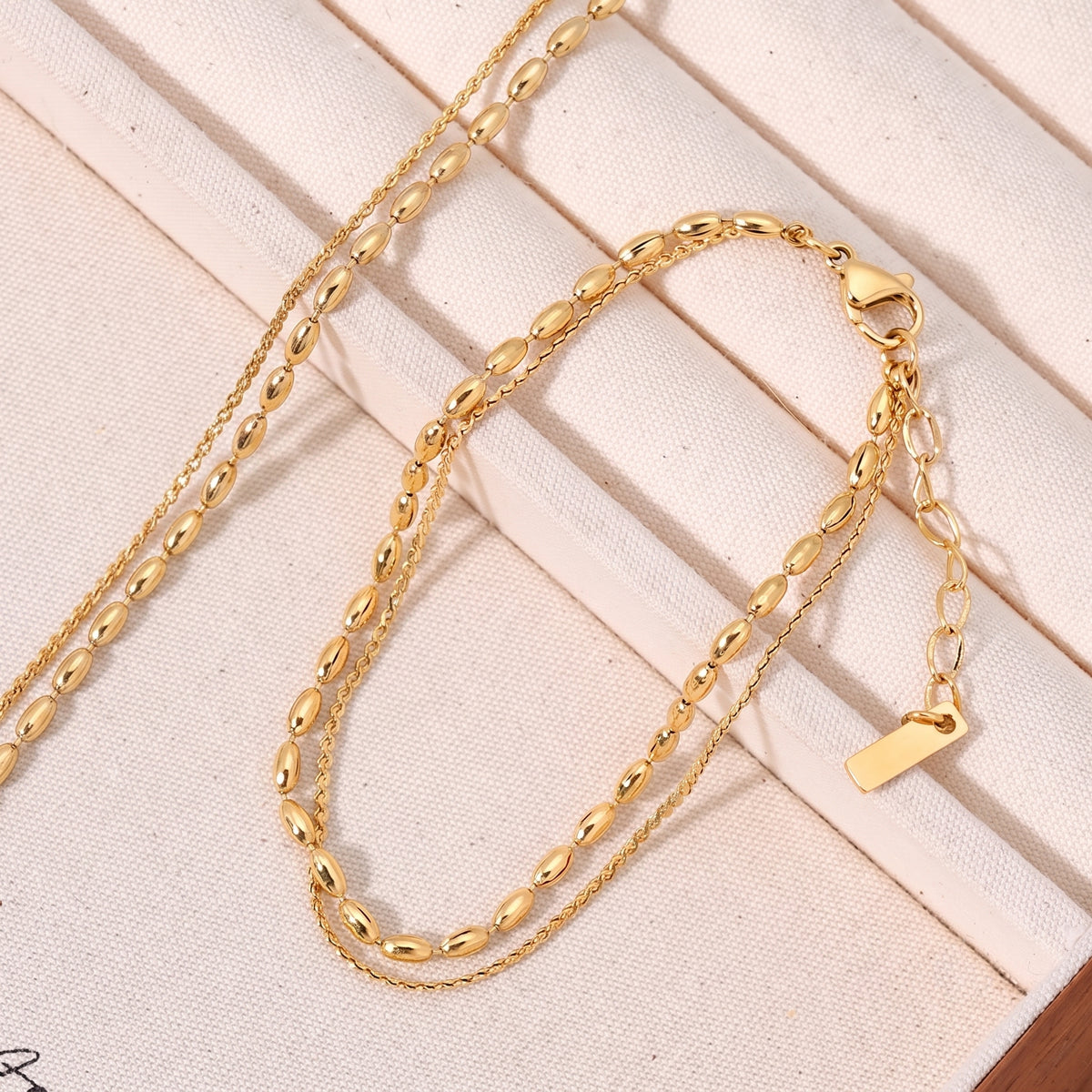 Aquabliss Double Layer Beaded Oval Link and Dainty Chain Gold-Tone Stainless Steel Bracelet
