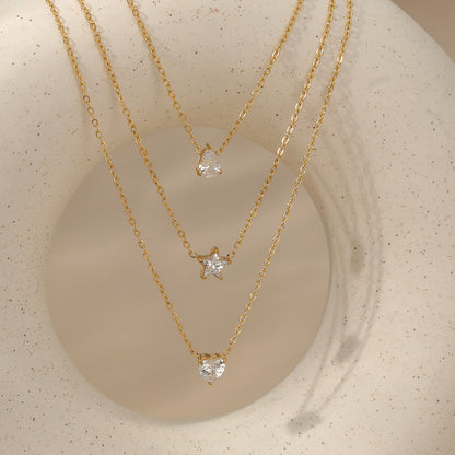 Aquabliss Triple Layer Gold-Tone Stainless Steel Necklace with Teardrop, Star, and Heart Pendants