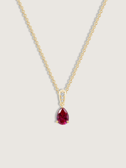 Pear Cut Created Ruby With Lab Grown Diamond Accent Pendant Necklace