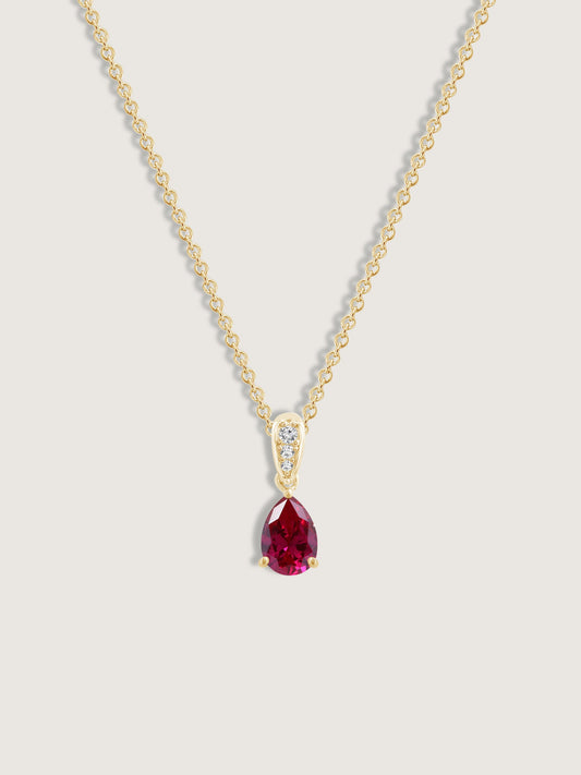 Pear Cut Created Ruby With Lab Grown Diamond Accent Pendant Necklace