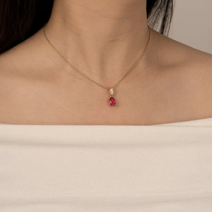 Pear Cut Created Ruby With Lab Grown Diamond Accent Pendant Necklace