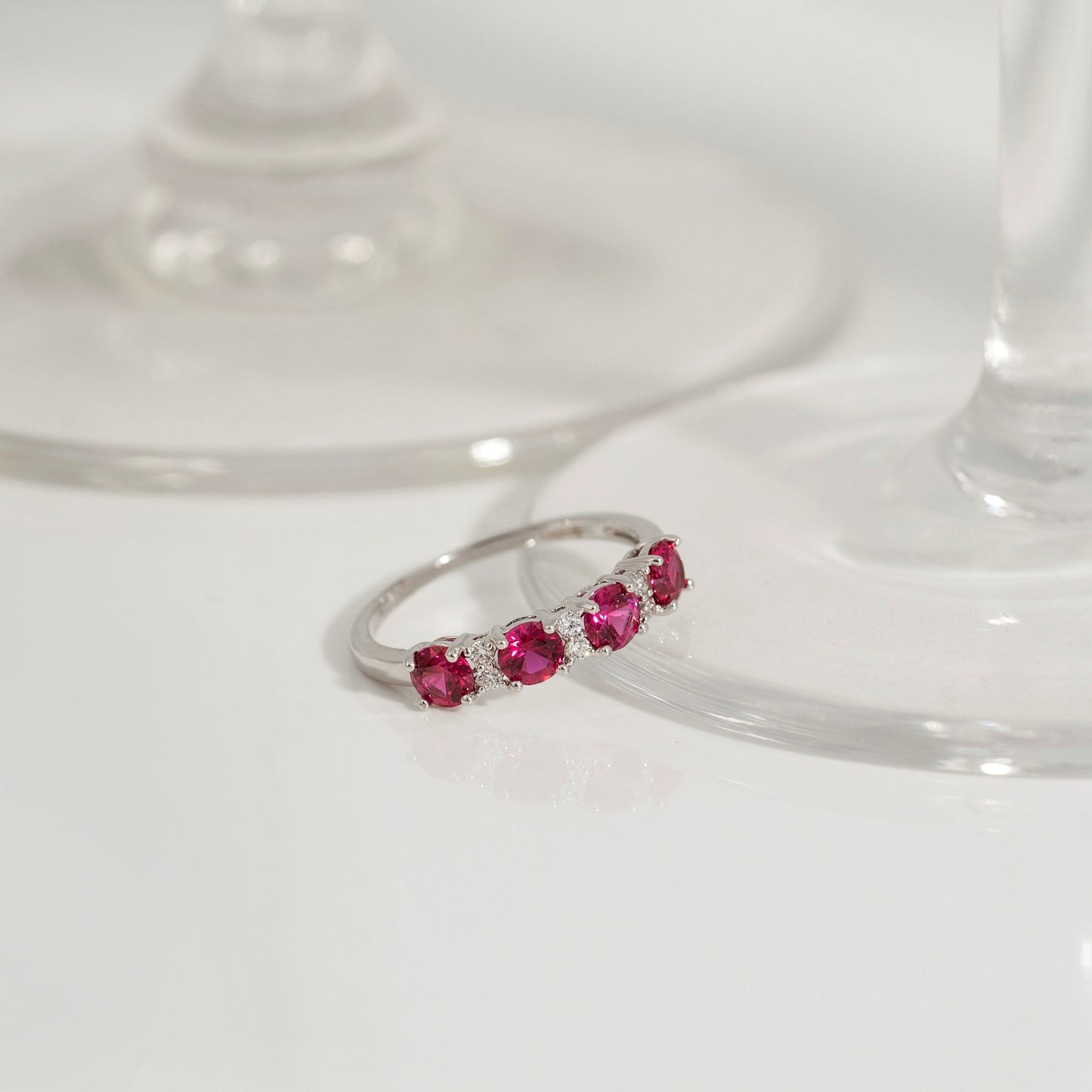 4mm Round Cut Created Ruby With Lab Grown Diamond Accent Half Band Ring