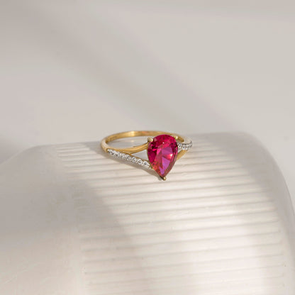 Pear Cut Created Ruby With Lab Grown Diamond Accent Ring