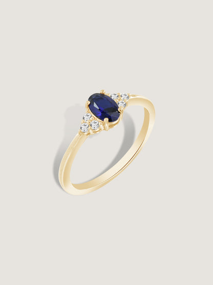 Oval Cut Created Sapphire With Trio Lab Grown Diamond On Shank Engagement Ring