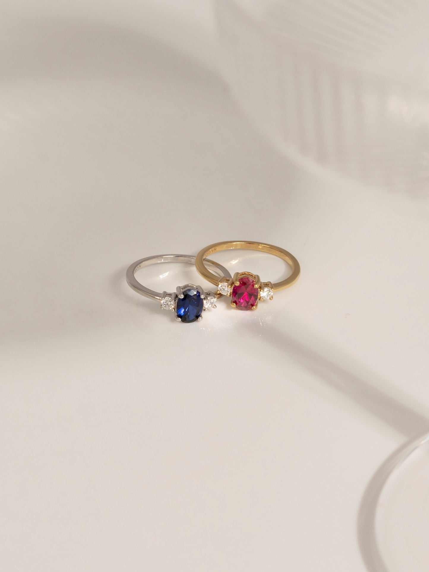 Oval Cut Created Ruby And Lab Grown Diamond Three Stones Ring