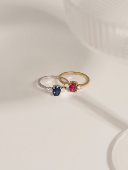 Oval Cut Created Ruby And Lab Grown Diamond Three Stones Ring