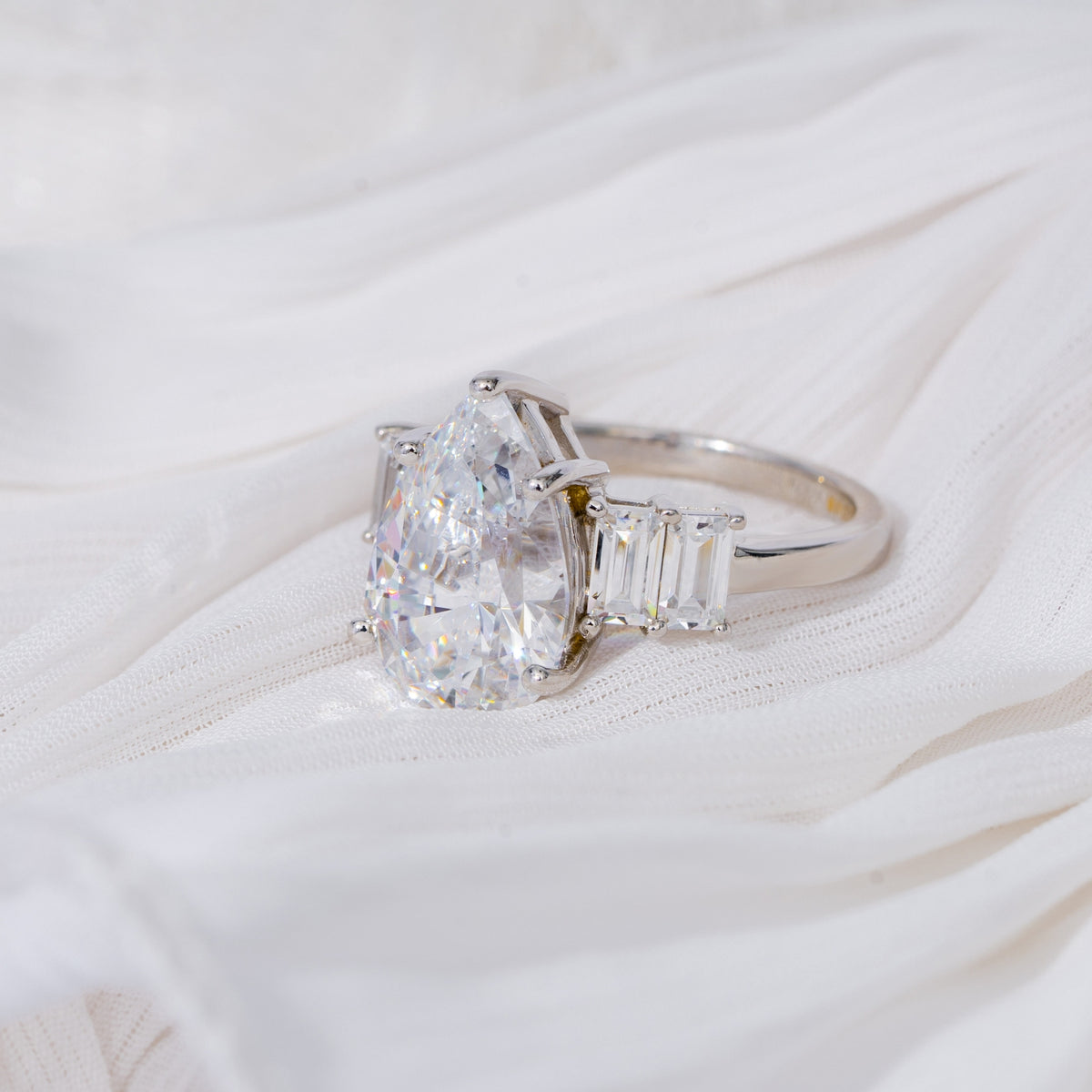 Vertical Baguette Accented Solitaire Ring