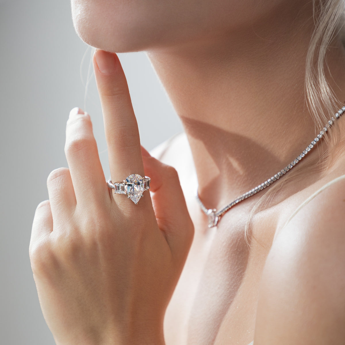 Vertical Baguette Accented Solitaire Ring